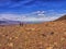 Two trekkers at a rocky viewpoint of Lago Viedma in Patagonia