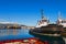 Two Tugboats and Containers Ship