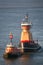 Two tugboats sailing in East River