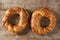 Two Turkish bagel Simit on wooden background