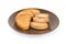 Two types of rusks on brown dish in selective focus