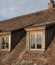 Two typical high bay roof windows. Reflection on the glasses in