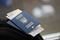 Two ukrainian biometrical passports with air flight tickets on black touristic backpack