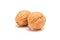 Two unbroken walnuts, close up macro, isolated on a white background