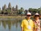 Two unidentified Traveler stand at Angkor Wat