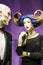 Two unusual dummies and original hairstyle. The girl with blue hair and in a black dress. Modern fashion.