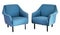 Two upholstered blue fifties armchairs