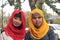 Two uzbek girls in colorful muslim veils, Uzbekistan