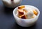 Two vanilla ice-cream with peach, selective focus