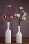 Two vases magnolia branches pink white flowers