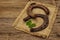 Two very old cast iron metal horse horseshoes, fresh clover leaf. Good luck symbol, St.Patrick`s Day concept