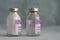 Two vials of antibiotics, in the one is powder, in the second is diluted  solution.,  injection drugs used in treatment of