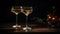 Two vintage champagne glasses on a dark background of the lux served table