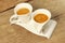Two Vintage Cups of Espresso on Grungy Wooden Table,