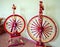 Two vintage nationally painted spinning wheels