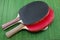 Two vintage table tennis rackets