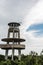 Two vultures landing on the roof of the observation tower in Shark Valley