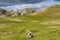 Two walkers hill walking at Attermire Scar above Settle in the Yorkshire Dales