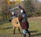 Two warriors in old Russian armors reconstructed medieval fight