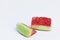Two watermelon slices made of candy with sugar