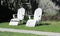 Two Weathered White Adirondack Chairs Symbols of Old Age, the Past, Time Passing, Togetherness