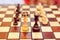 two wedding rings on chessboard