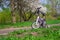 Two-wheeled white-purple bike with extra side wheels