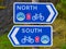 Two white on blue signs for the UK National Cycle Route 1 in Lerwick, Shetland, Scotland, UK