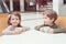 Two white Caucasian cute adorable funny children drinking talking