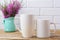 Two white coffee and cappuccino mug mockup with maroon purple fl