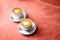 Two white cups of tasty cappucino with love art latte. Valentine`s concept.