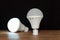 Two white emergency led bulbs with integrated battery