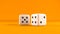 Two white game dice placed on orange background. Casino cube with black number used in games. 3D render