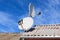 Two white satellite dish on the roof