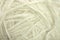 Two White Sheep Wool Roll On Wooden Background