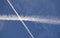 Two white trails from commercial airplanes, white moon near - chemtrails conspiracy theory concept