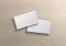 Two white US business card Mockup. American size calling card front and back on wood 3D rendering