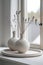 Two White Vases on Window Sill