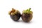 Two of whole mangosteen fruits on white background