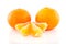 Two whole tangerines and slices