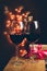 Two wine glasses on a parkling heart shape backdrop