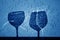 Two wine glasses shadow in navy blue tone