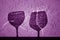 Two wine glasses shadow in purple tone