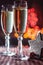 Two wineglasses of champagne and new year`s decorative wood star