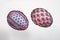 Two wired Easter eggs blue and pink