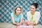 Two woman bakers making macaroons