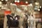 Two woman mannequins in dresses in supermarket