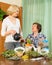 Two women brewing herbal tea