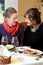 Two women chatting in restaurant