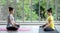 Two women in class, relaxation exercise or yoga class